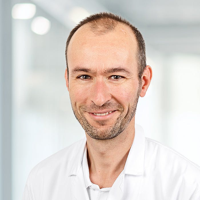 Portrait photo of Dr Patrick Muggensturm