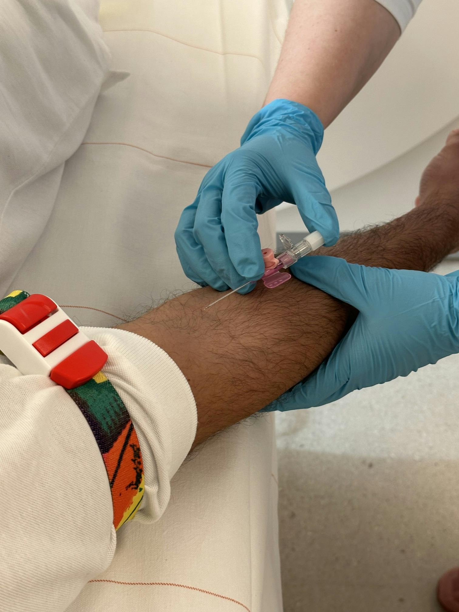 Blood sampling from the arm vein for medical tests.