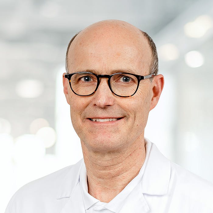 Portraitfoto von Prof. Dr. med. Dr. phil. Adrian Reber